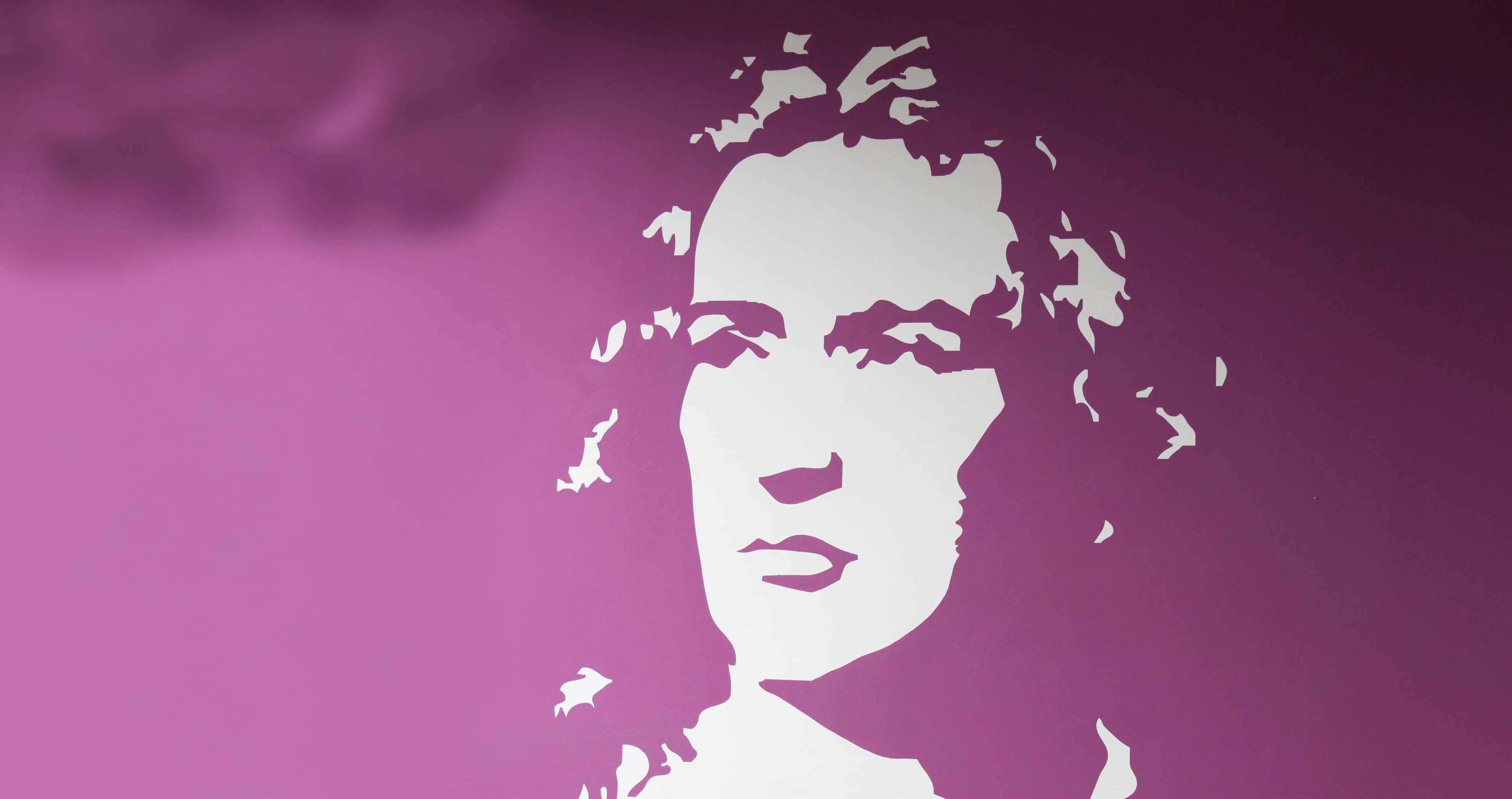 a silhouette of Friedrich Schillers face on a purple background .